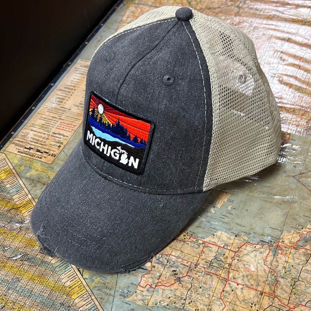 Michigan Lake Weathered Trucker Cap - Black with light tan mesh on back.
